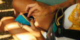 Chums Surfshorts Wallet in teal rust