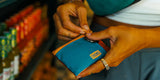 Chums Surfshorts Wallet in teal rust