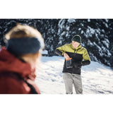 Fidlock Dry Bag – Medi  in the colour orange used in the snow