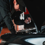 Nebo Columbo 100 hown in a hand with the light on