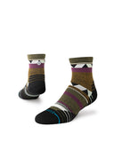 Stance Climbers Mid Wool Quarter Sock in the colour Green shown on a foot shape..