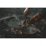 Robens Fire Gloves in use around the campfire