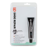 A tube of one ounce or 28 grams of Gear Aid Aquaseal + SR Shoe Repair Adhesive in its multilingual packaging