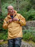 Hilltrek Braemar Single Ventile Smock with single layer organic cotton ventile fabric in Survival colour showing the smock in action in the woods.