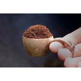 Coffee measuring with the Kupilka Mini Cup 10ml in the colour Brown