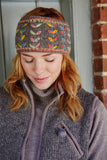 A woman wearing a Pachamama Kylemore Headband in grey