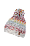Pachamama Langtang Bobble Beanie in Multi. A rainbow striped bobble beanie on a white background