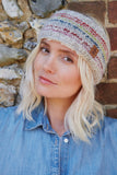 Pachamama Langtang Headband Multi on smirking model.