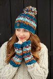 Pachamama Utrecht Handwarmer shown on a model also wearing the Pachamama Utrecht Bobble Beanie