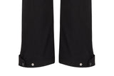 Detail of the trouser cuff adjustment on the Silverpoint Women's Braemar Waterproof Winter Lined Trousers in the colour black