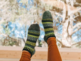 Solmate Lemongrass Ankle Trainer Tab height Socks shown waggling in the air