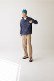 KAVU Teannaway Fleece in Blue Water Topo shown on male model from the front. 