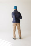 KAVU Teannaway Fleece in Blue Water Topo shown on male model from the back.