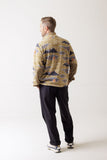 KAVU Teannaway Fleece in Sasquatch Sighting shown on male model from the back.