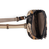 KAVU Sling Sling in Evening Bloom shown from the top looking into the main zip compartment.  