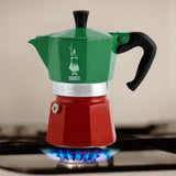 Bialetti Moka Express Aluminium Stove Top Coffee Maker (3 Cup) - Italia Collection shown on gas hob