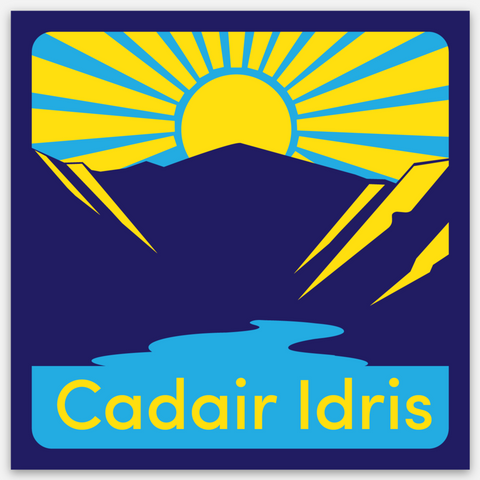 Cadair Idris mountain sticker with sun, mountain, and lake design, featuring the text 'Cadair Idris' on a blue background.