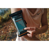 Fidlock Dry Bag Armband in Black/Transparent colour shown worn on the arm