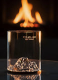 Gilded Peaks Helvellyn Glass shown from the front, in front of a fire