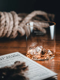 Gilded Peaks Helvellyn Glass tumbler with whiskey in, shown from the front 