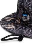 KAVU BFE Hat in the colour Quiet Wildflower, shown from the logo and tie cord