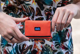 KAVU Billings Wallet in the colour Orange Pop, shown from front 