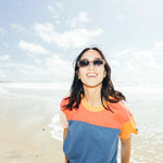 KAVU Eevi T-Shirt in the colour fruit mix worn at the beach