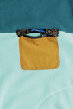 KAVU Kelowna Fleece in the colour Teal Tumble, shown from the pocket