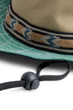 KAVU Organic Strap Bucket Hat in the colour Forest Mix, shown from the cord fastening