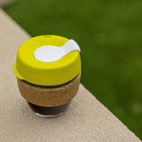 KeepCup Brew Cork Ace Small 8oz/227ml Glass Reusable Cup with Slice coloured lid and cork band.