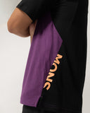 Mons Royale Mens Diversion Merino Bike Jersey Short Sleeve in the colour Boysenberry / Black, shown from the side