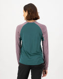 Mons Royale Womens Tarn Merino Long Sleeve in the colour Abyss Mauve, shown from the back on a model