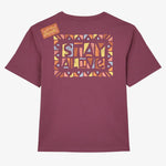 back of Oxbow TOBOB Tee-shirt in Acai showing colourful logo saying, 'Stay Alive'