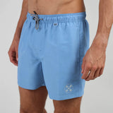 Oxbow VALENS Shorts , Teahupoo close up on man showing white logo and black and white draw string