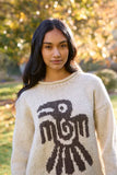 Pachamama Bird Sweater shown from the front, on a model