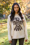 Pachamama Bird Sweater shown from the front, on a model