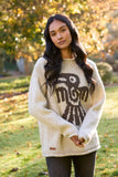Pachamama Bird Sweater shown from the front, on a model