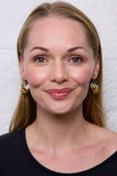 Pachamama Bumble Bee Earrings shown on a model