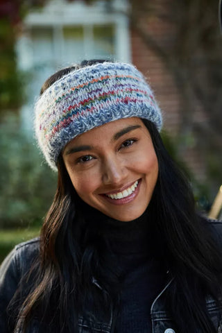 Pachamama Coroico Headband worn with a big smile