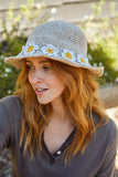 Pachamama Hemp/Cotton Sun Hat - Daisy Chain in the colour natural with female model looking right