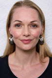 Pachamama Herdi Sheep Earrings shown on a model