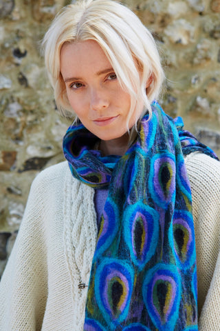 Pachamama Scarf in Peacock print, shown on a model