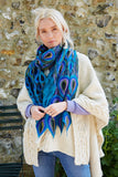 Pachamama Scarf in Peacock print, shown on a model