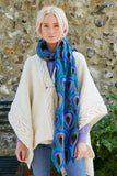 Pachamama Scarf in Peacock print, shown on a model