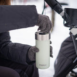 Primus Slurken Vacuum Mug 0.4L shown in the colour mint in use outside