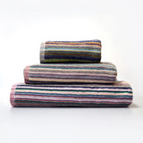 Remnant Recycled Cotton Bath Towel - Striped shown in a folded pile of three.