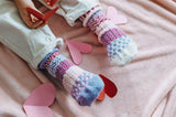 Solmate Lovebug Kids Socks shown on a model's feet