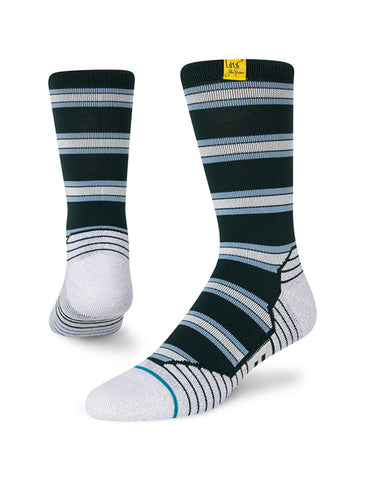  Stance Augusta Champion Crew Sock in the colour green shown on a foot shape..