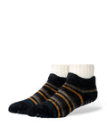 Stance Cozy Slipper Quarter Sock in the colour Black shown on a foot shape..