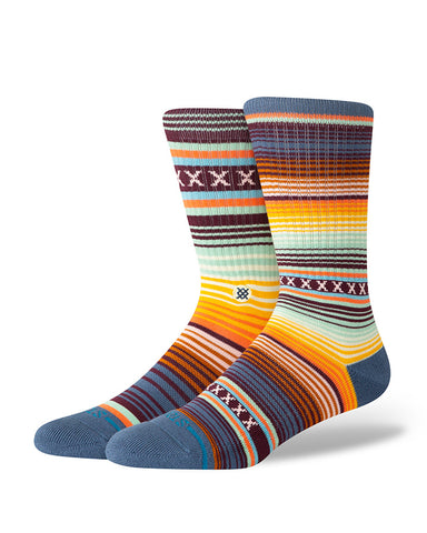 Stance Curren Crew Sock in the colour sea blue shown from the side on a foot shape